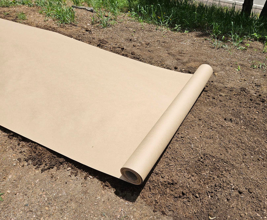 A roll of Organic Biodegradable Paper EcoMulch lying on the ground