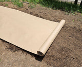 A roll of Organic Biodegradable Paper EcoMulch lying on the ground