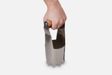 A handheld sharp metal tool for cutting holes in mulch or landscaping materials