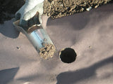 close up image of Sharp Metal Hole Punch for Planting