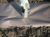 close up image of  Sharp Metal Hole Punch for Planting